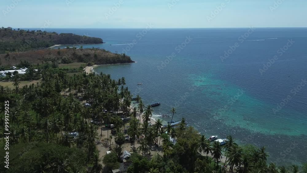 Lombok Island Indonesia Beach Coast View Top Down Fishing Trimarans and Speedboats Offshore on Beach Lombok Island Indonesia Beach Coast View Top Down Fishing Trimarans and Speedboats Offshore on Beach