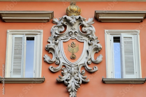 Obraz na płótnie Ornate architectural detail with crown and coat of arms w salonie