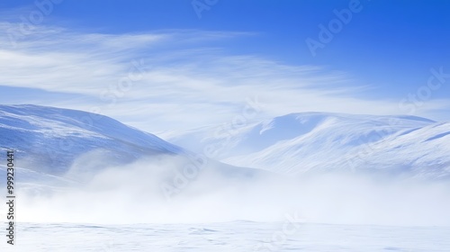 5. A snow-covered landscape with a single small hill in the distance and a clear, pale blue sky overhead