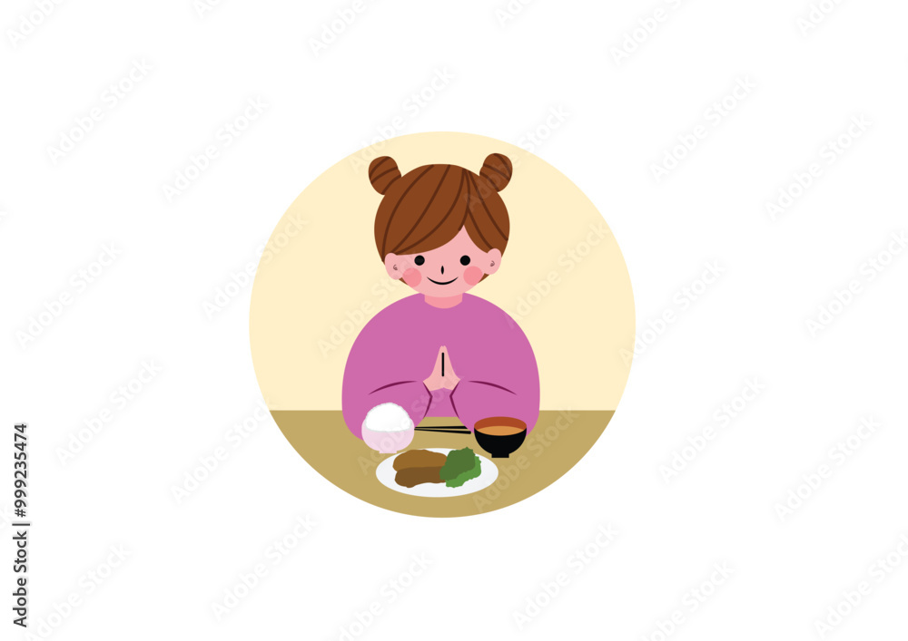 食事の前にいただきますをする女の子 食事の前にいただきますをする女の子
