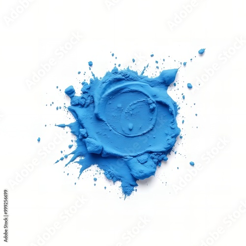 a close up of a blue paint splattered on a white surface. photo