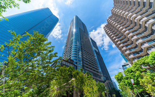 Photography looking up view of city skyline in tokyo, japan