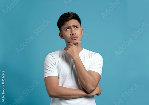 Asian Indonesian Man Thinking Deeply