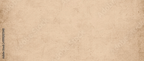 Vintage paper background. Old grainy sepia texture with dust and scratches