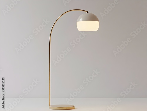 Elegant Mid Century Modern Brass Arc Floor Lamp in Minimalist White Studio Setting