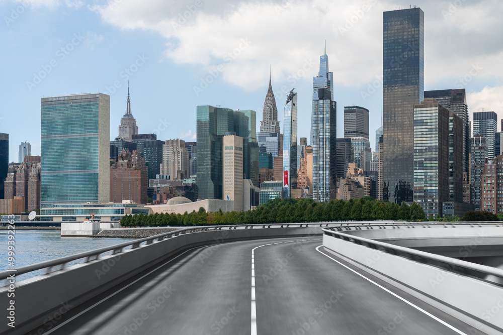 Empty highway leading to New York City skyline with skyscrapers in the background. Empty highway leading to New York City skyline with skyscrapers in the background.
