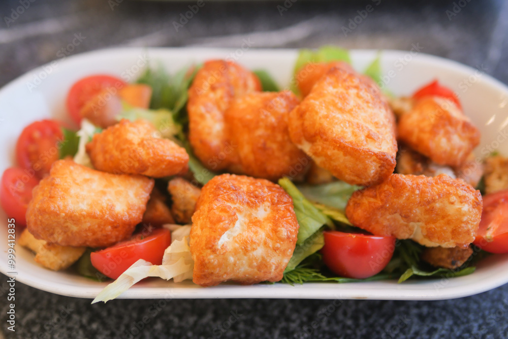 Indulge in a delicious Crispy Fried Shrimp Salad made with Fresh and vibrant Vegetables Indulge in a delicious Crispy Fried Shrimp Salad made with Fresh and vibrant Vegetables
