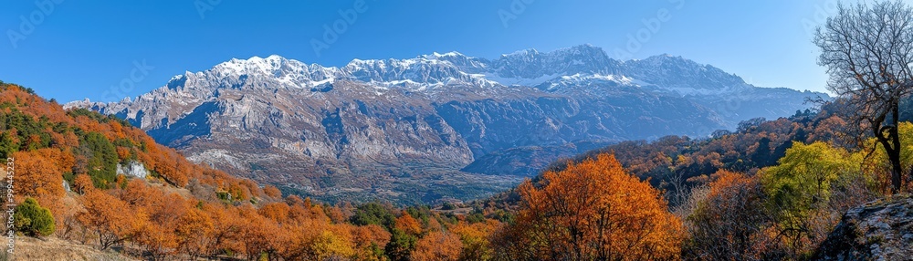 Stunning Autumn Landscape with Snowy Mountains Stunning Autumn Landscape with Snowy Mountains