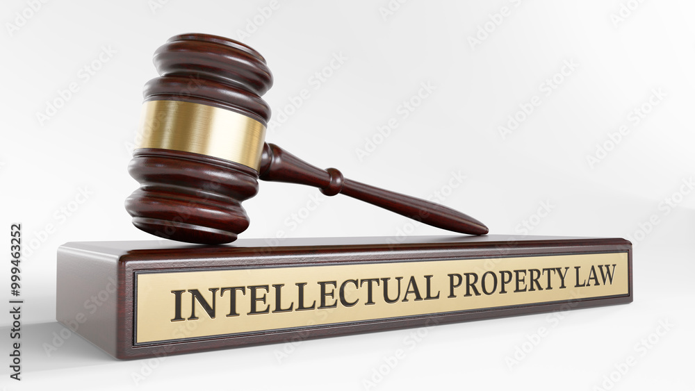 Intellectual Property: Judge's Gavel as a symbol of legal system and wooden stand with text word Intellectual Property: Judge's Gavel as a symbol of legal system and wooden stand with text word