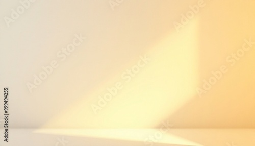 Obraz na płótnie A soft, yellow light shines through a window onto an empty white surface. w salonie