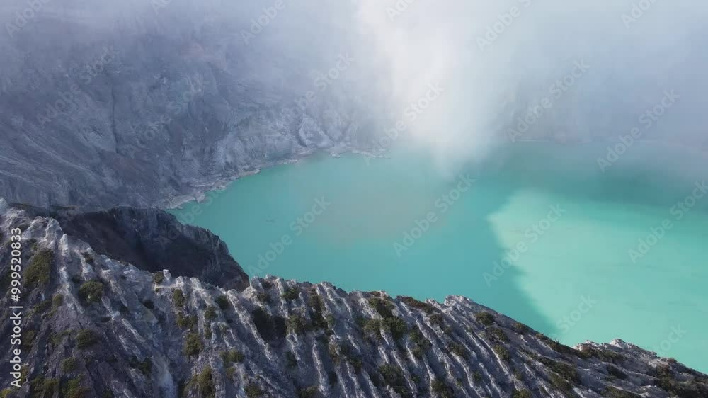 Aerial view of the active volcano crater of Mount Ijen in Java, Indonesia Aerial view of the active volcano crater of Mount Ijen in Java, Indonesia