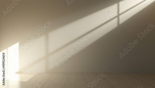 Sunlight streams through a window and casts shadows on a beige wall and wooden floor.