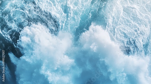 Aerial View of Powerful Ocean Waves Crashing and Creating White Foam in Turquoise Blue Sea