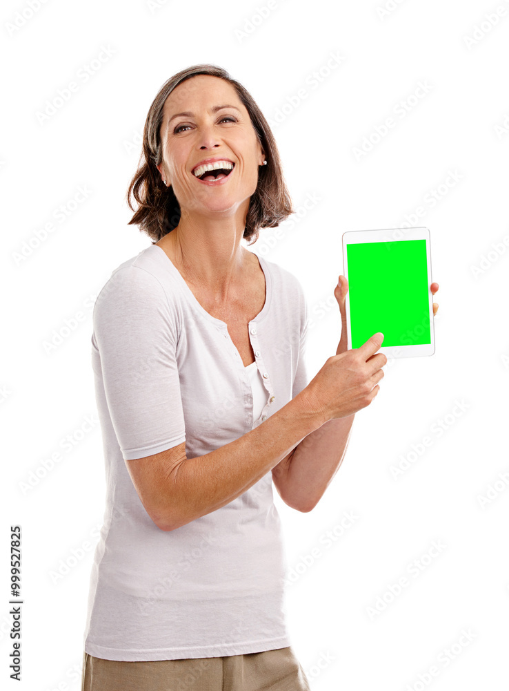 Portrait, studio and mature woman with tablet, green screen and laughing for promotion of app and display. White background, advertising and person in space, smile and announcement of discount Portrait, studio and mature woman with tablet, green screen and laughing for promotion of app and display. White background, advertising and person in space, smile and announcement of discount