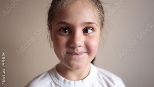 Quadro em tela child girl playing funny a squinting eyes