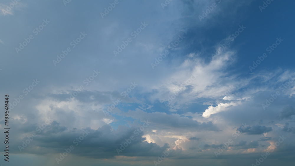 Obraz premium Ominous clouds slowly drift across sky. Dark stormy cloud motion big stormy rain day. Timelapse.