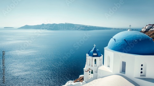 Sea and iconic view of blue and white church bell tower