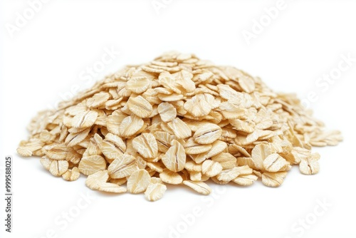 Isolated bunch of oatmeal flakes on white background showcasing natural grain texture