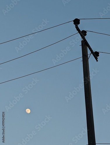 Electricity pole with a moon