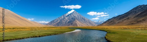 Serene mountain landscape with a clear river flowing through a green valley photo