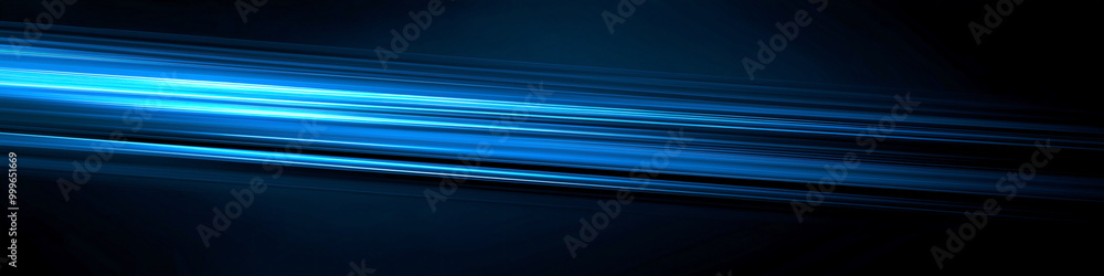 Blue light streaks on a black background with glowing horizontal lines in a high speed motion blur effect. Blue light streaks on a black background with glowing horizontal lines in a high speed motion blur effect.