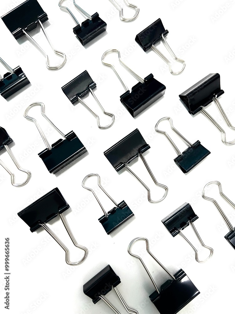 Obraz premium Paper clips on a white background.