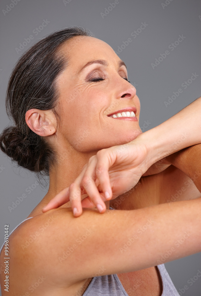 Mature woman, beauty and studio for soft feeling, confident collagen and gray background. Female person, skincare and results of antiaging treatment, cosmetics glow and smooth touch for dermatology Mature woman, beauty and studio for soft feeling, confident collagen and gray background. Female person, skincare and results of antiaging treatment, cosmetics glow and smooth touch for dermatology