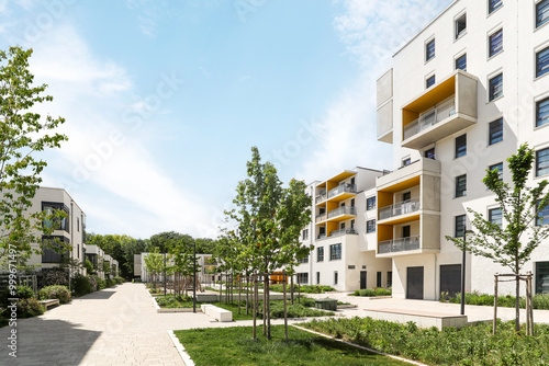 Residential area with ecological and sustainable green residential buildings, low-energy houses with apartments and green courtyard