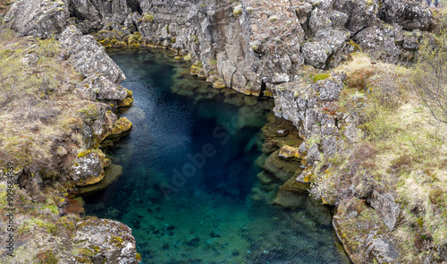 cold, clear turquoise water in the Peningagjá fissure, Thingvellir (Þingvellir) National Park, Iceland