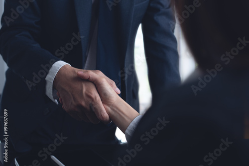 Businessmen making handshake with partner at office, greeting, dealing, merger and acquisition, successful deal concept, for business, finance background, teamwork, partnership, hand shaking