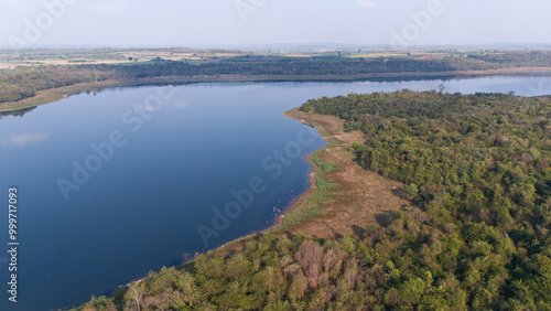 Aerial view of the reservoir dam and forest at a rural countryside