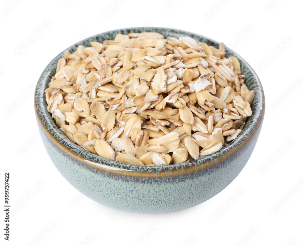 Dry oat flakes in bowl isolated on white Dry oat flakes in bowl isolated on white