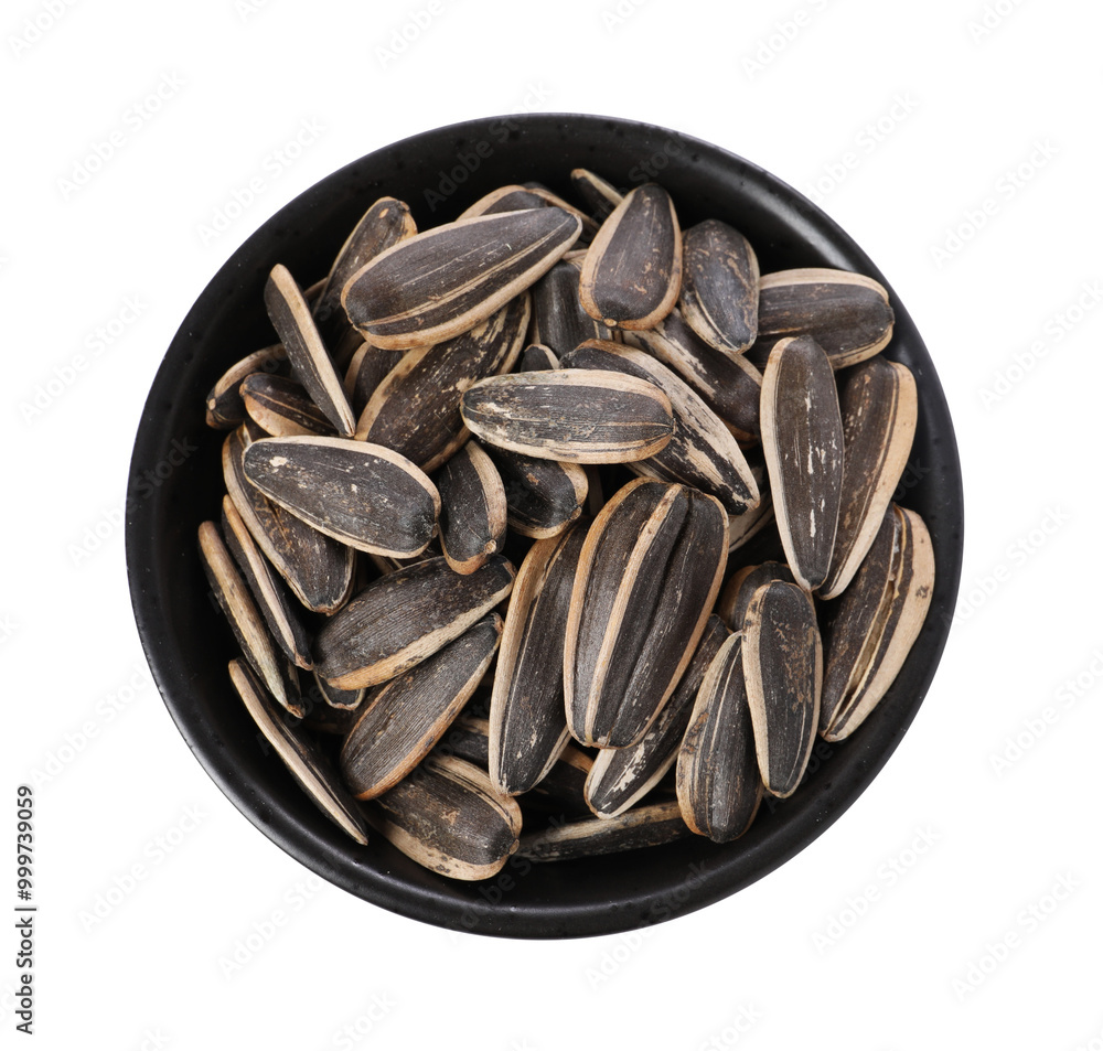 Sunflower seeds in bowl isolated on white, top view Sunflower seeds in bowl isolated on white, top view