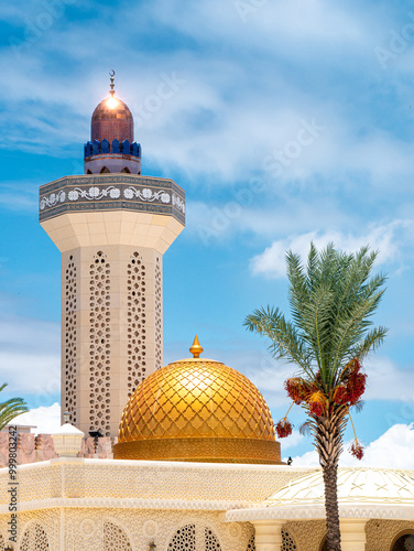 Golden dome and a minaret on the Great Mosque of Touba, Senegal