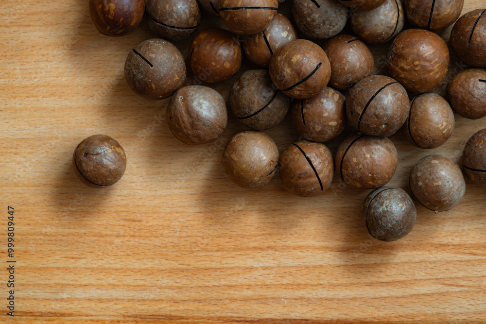 unpeeled macadamia nut textured background unpeeled macadamia nut textured background