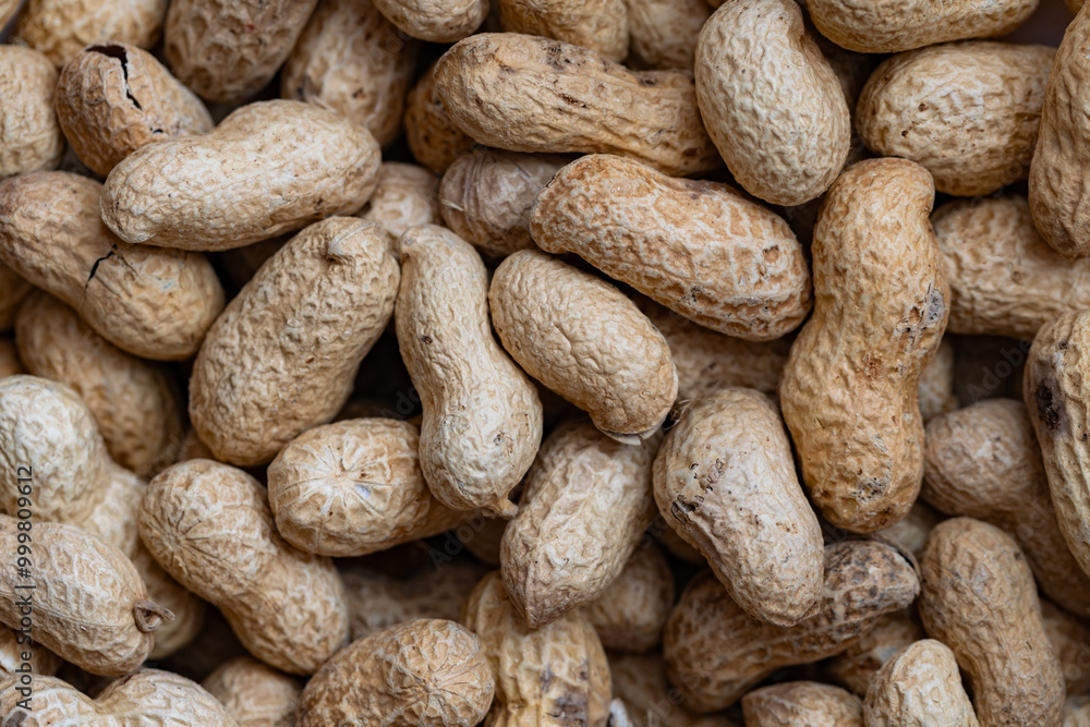 closeup of peanuts textured background closeup of peanuts textured background