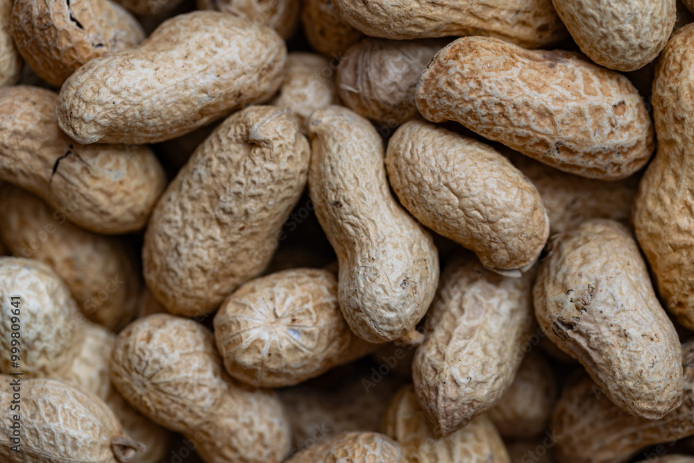 closeup of peanuts textured background closeup of peanuts textured background
