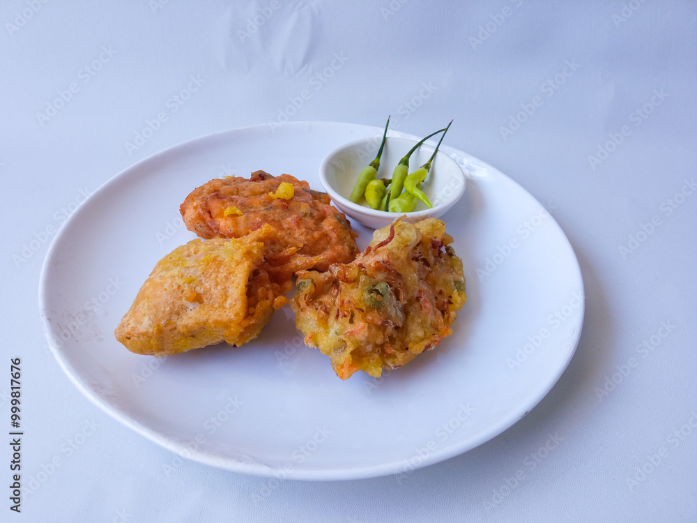 Gorengan : Fried food is one of the most popular types of snacks in Indonesia. Indonesian street food.White background.