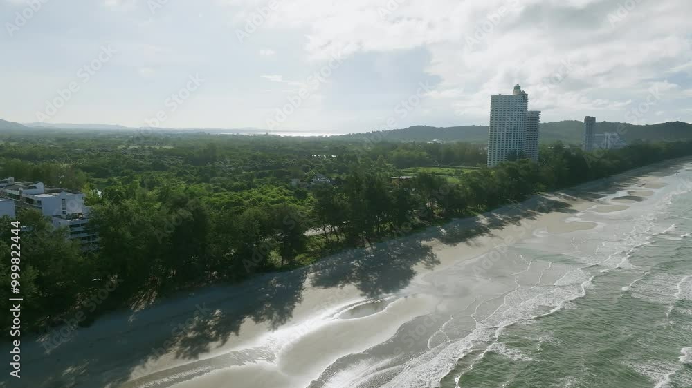 Explore the Serene Shoreline and Lush Landscapes Along the Coast on a Sunny Day in Thailand Explore the Serene Shoreline and Lush Landscapes Along the Coast on a Sunny Day in Thailand