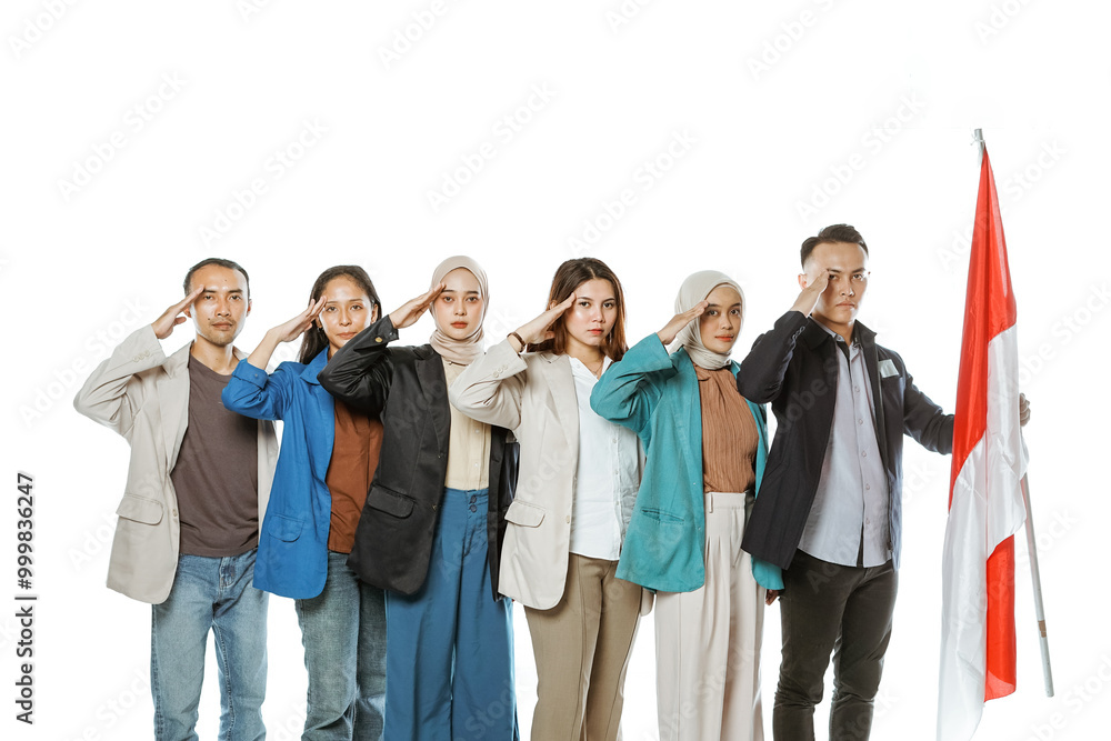university students holding indonesian flag with salute gesture in isolated white background university students holding indonesian flag with salute gesture in isolated white background