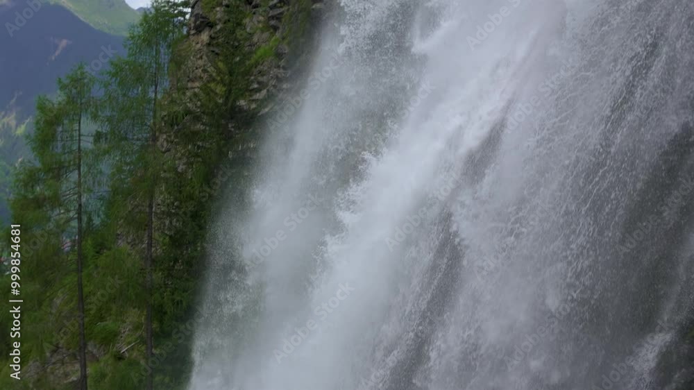 Slow motion of water falling down in Stuibenfall waterfall in Tirol alps nature Slow motion of water falling down in Stuibenfall waterfall in Tirol alps nature