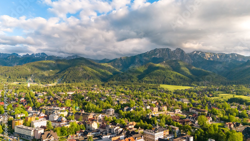 aerial view of the city of Zakopane and the city around in the evening in Poland at sunset