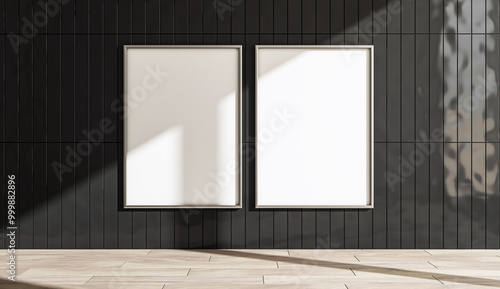 Fototapeta Naklejka Na Ścianę i Meble -  Two vertical empty frames on a black tiled wall with wooden floor. 3D Rendering