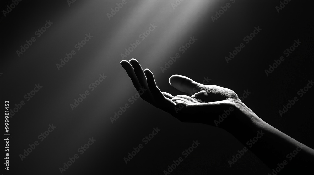 Obraz premium Illuminated Hand Reaching for Hope