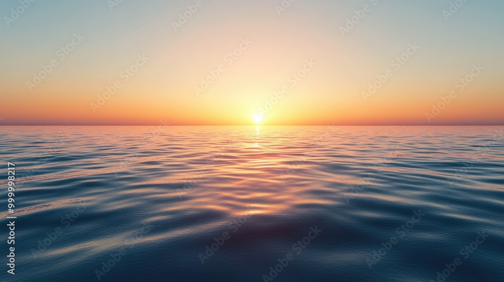 Fototapeta premium A breathtaking sunrise over a calm ocean, with a clear sky providing ample space for adding text.