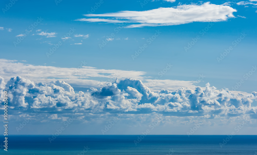 Tangle of clouds on the horizon over the sea Tangle of clouds on the horizon over the sea