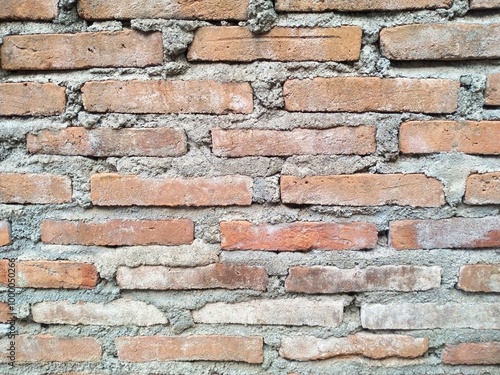 Red brick wall with rough and coarse texture 