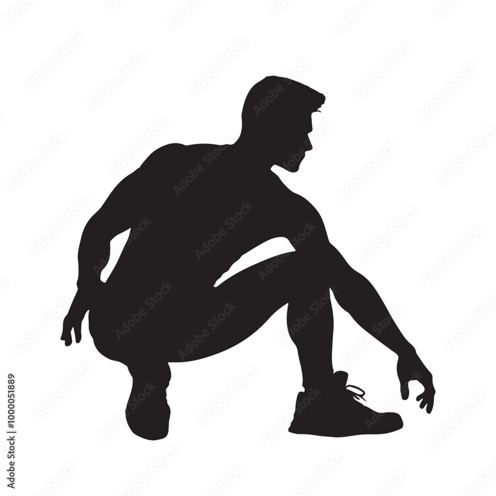 Silhouette of a figure crouching in an action pose vector on a white background Silhouette of a figure crouching in an action pose vector on a white background