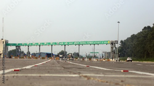 Toll road traffic time lapse during rush hour in Delhi City India.  photo