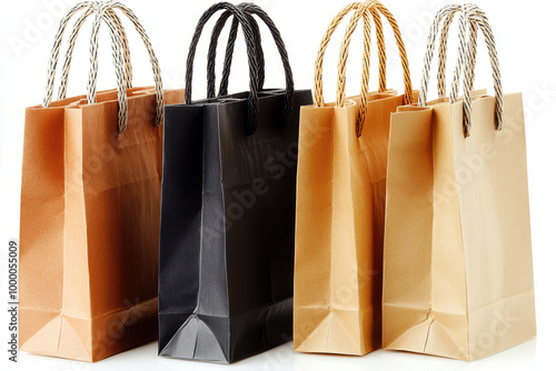 Black and brown shopping bags with twisted handles isolated on white background photo